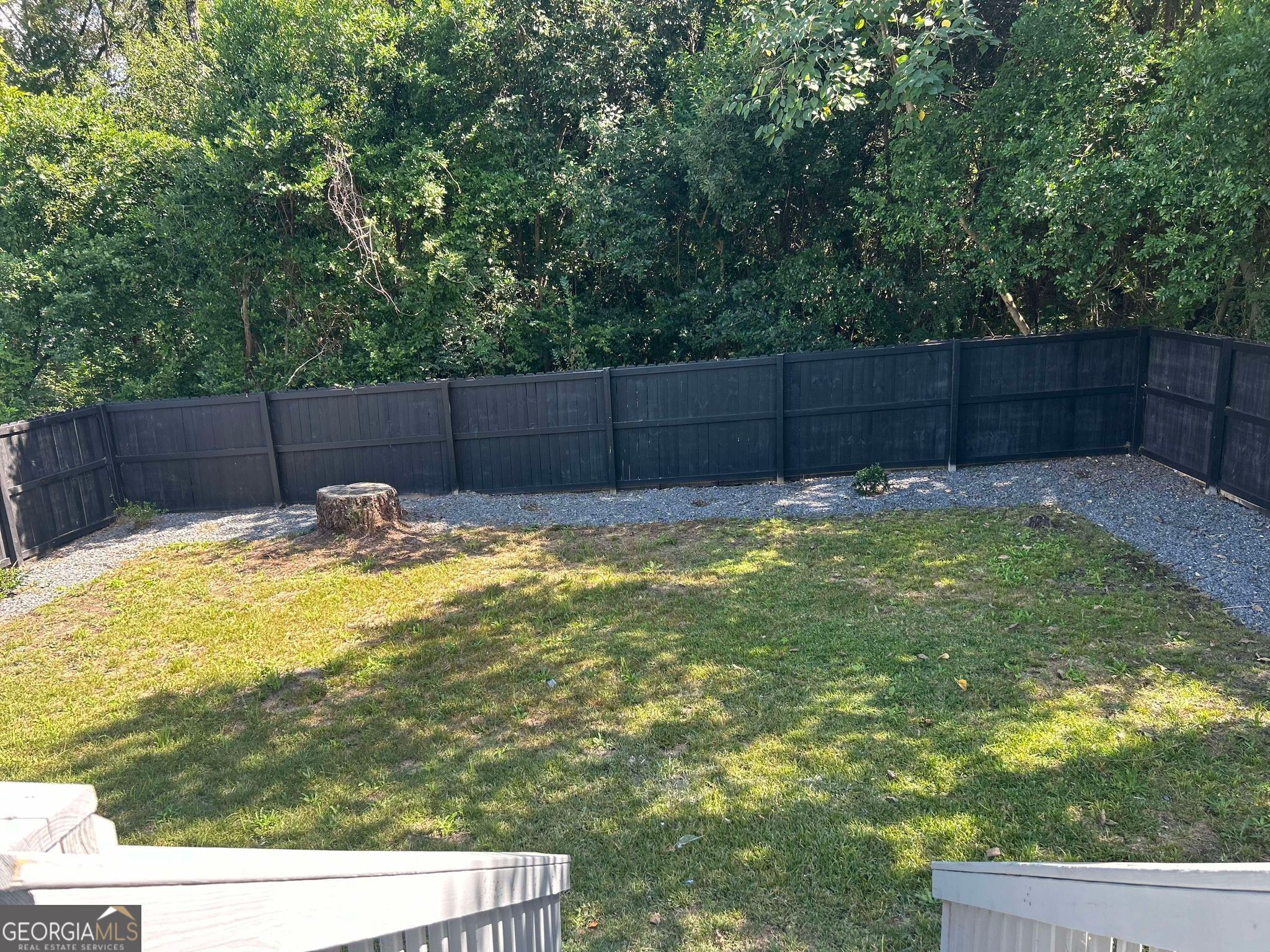 1428 2nd Street Macon, GA 31201 - Photo 2 of 10 a swimming pool with a small yard