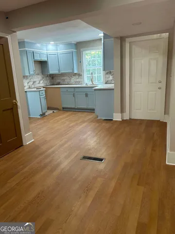 a view of kitchen and window
