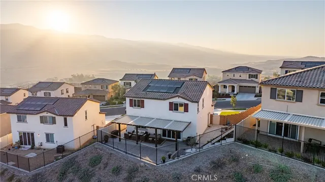 an aerial view of residential house with outdoor space