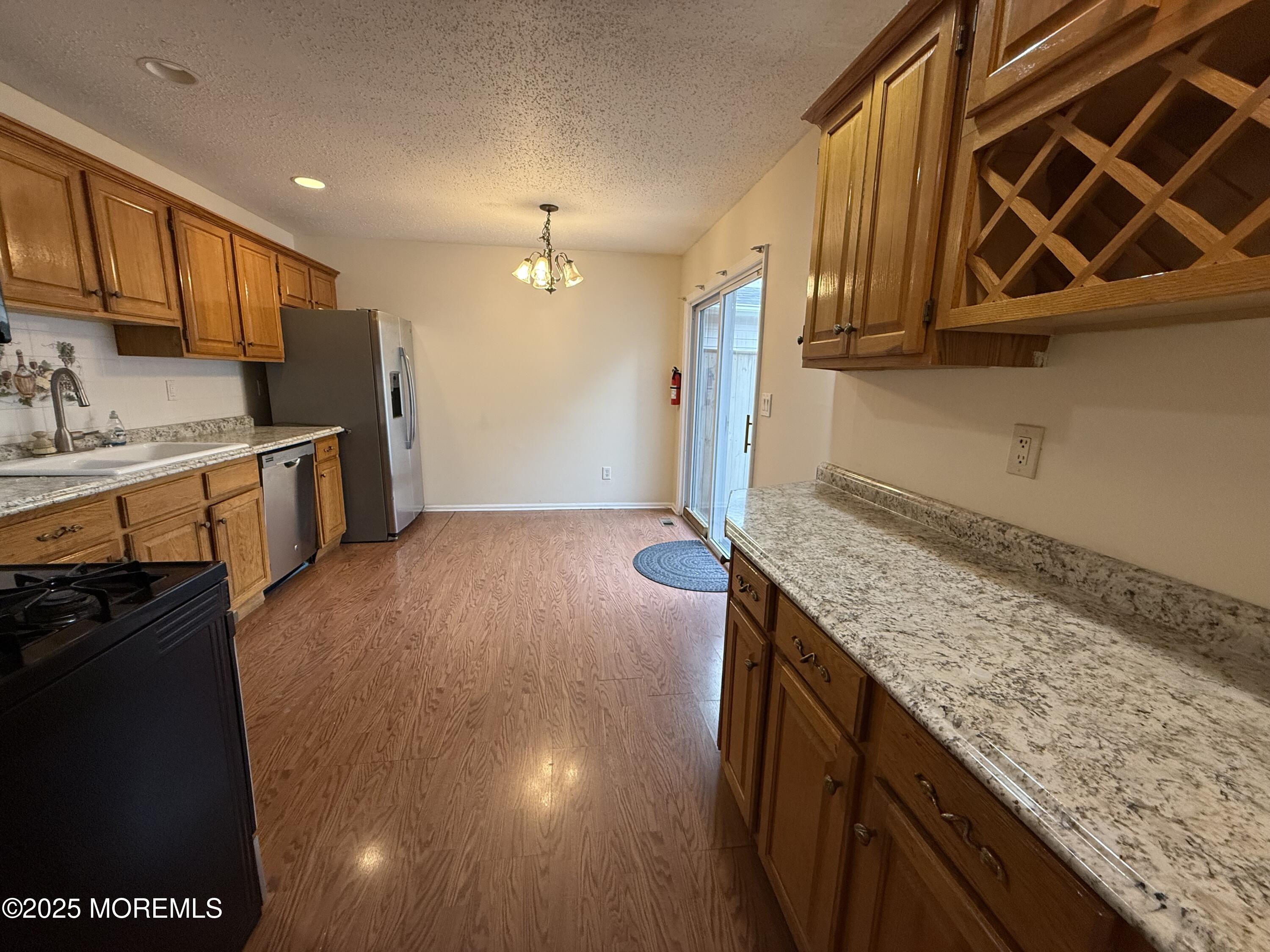 27 Barn Swallow Boulevard Marlboro, NJ 07746 - Photo 4 of 18 Spacious Kitchen