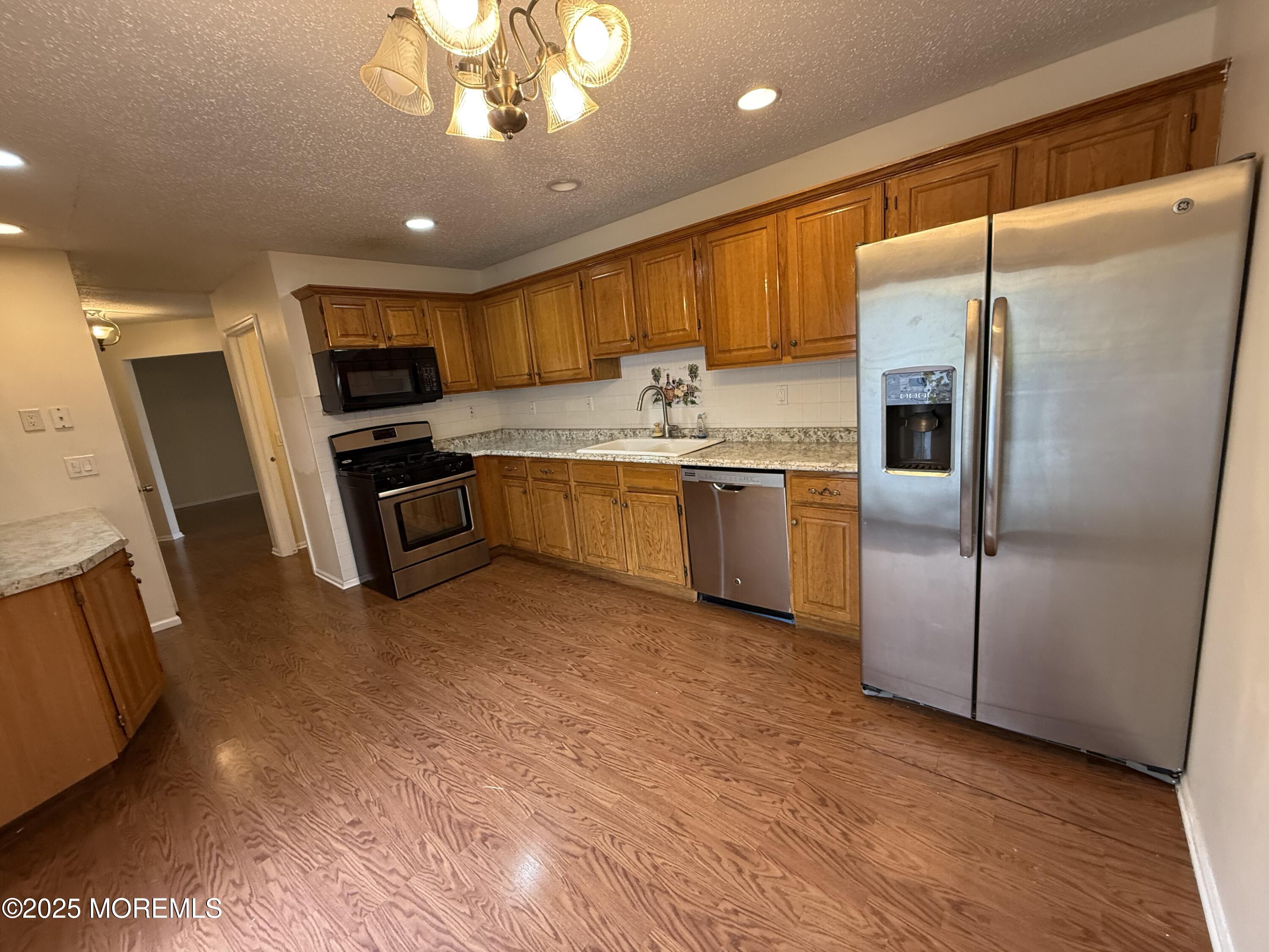 27 Barn Swallow Boulevard Marlboro, NJ 07746 - Photo 5 of 18 Plenty of Cabinets
