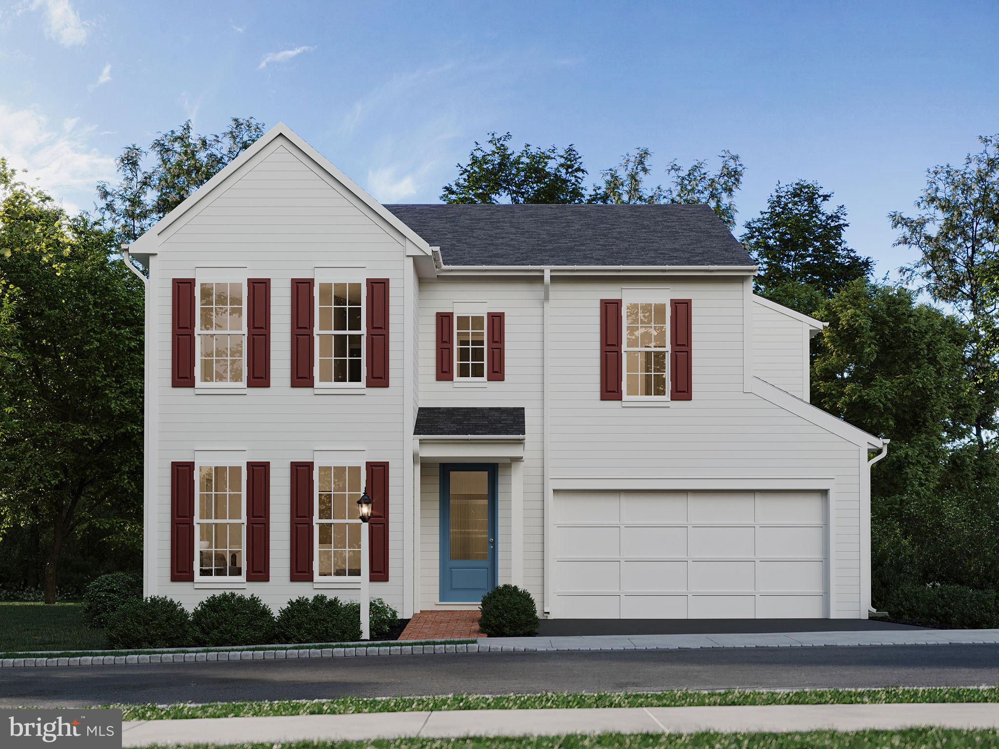104 Merchant Avenue, Unit DUNDEE Mount Joy, PA 17552 - Photo 1 of 40 a front view of a house with a yard