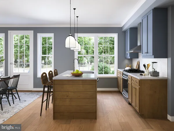 a kitchen with kitchen island wooden floors and white appliances