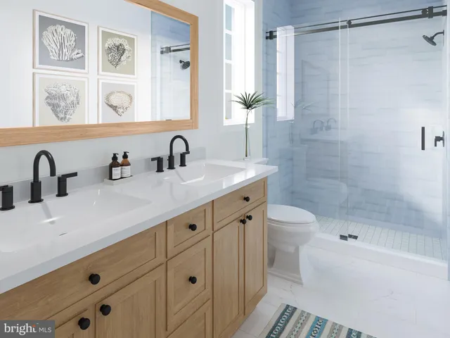 a bathroom with a granite countertop sink a mirror a shower and a bathtub