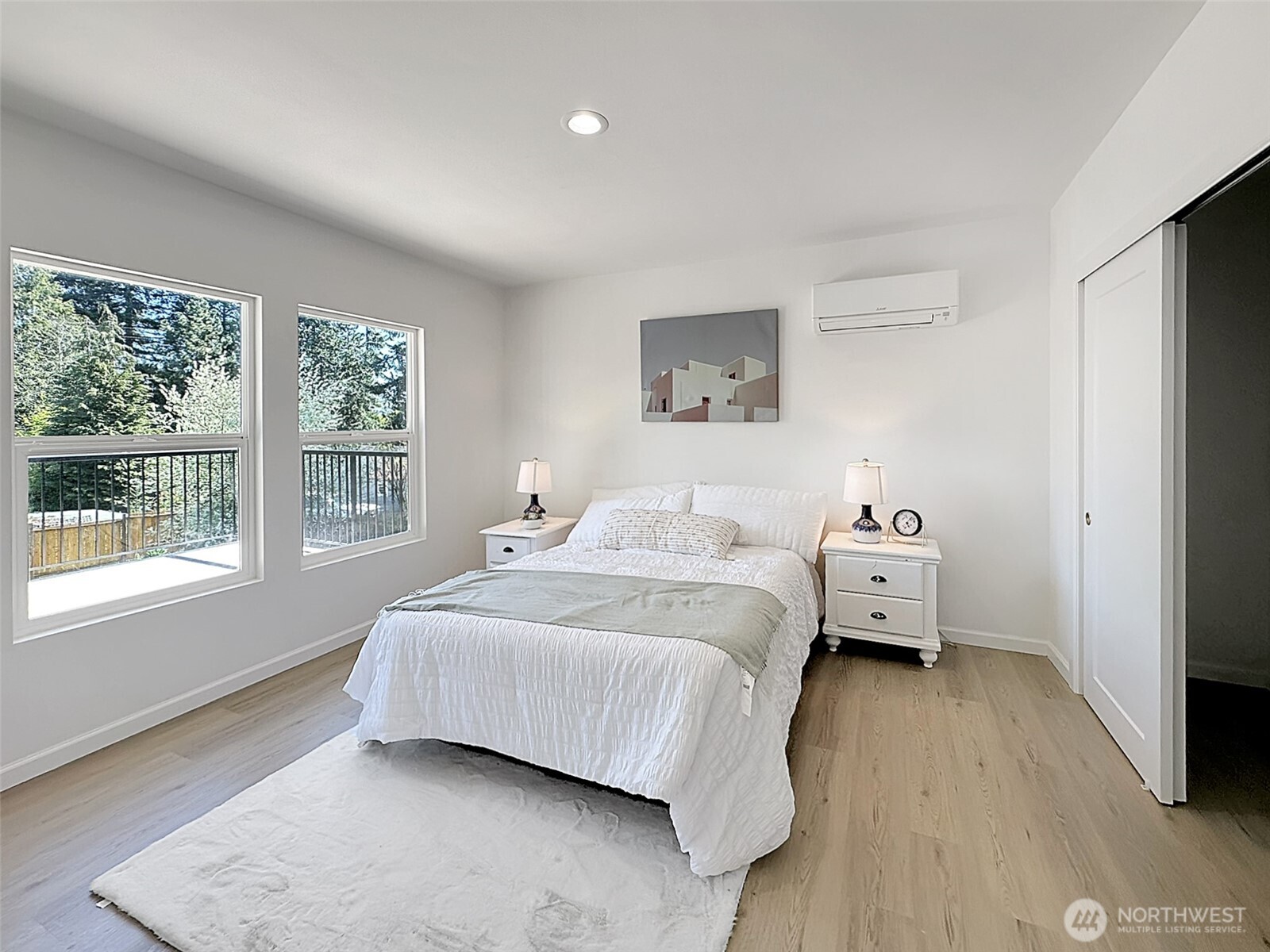 7403 Beverly Boulevard Everett, WA 98203 - Photo 7 of 19 a bedroom with a bed and a large window