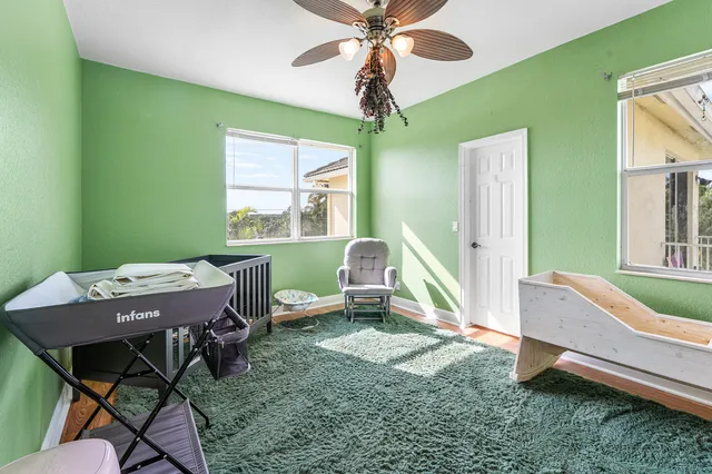 a work room with furniture and a window