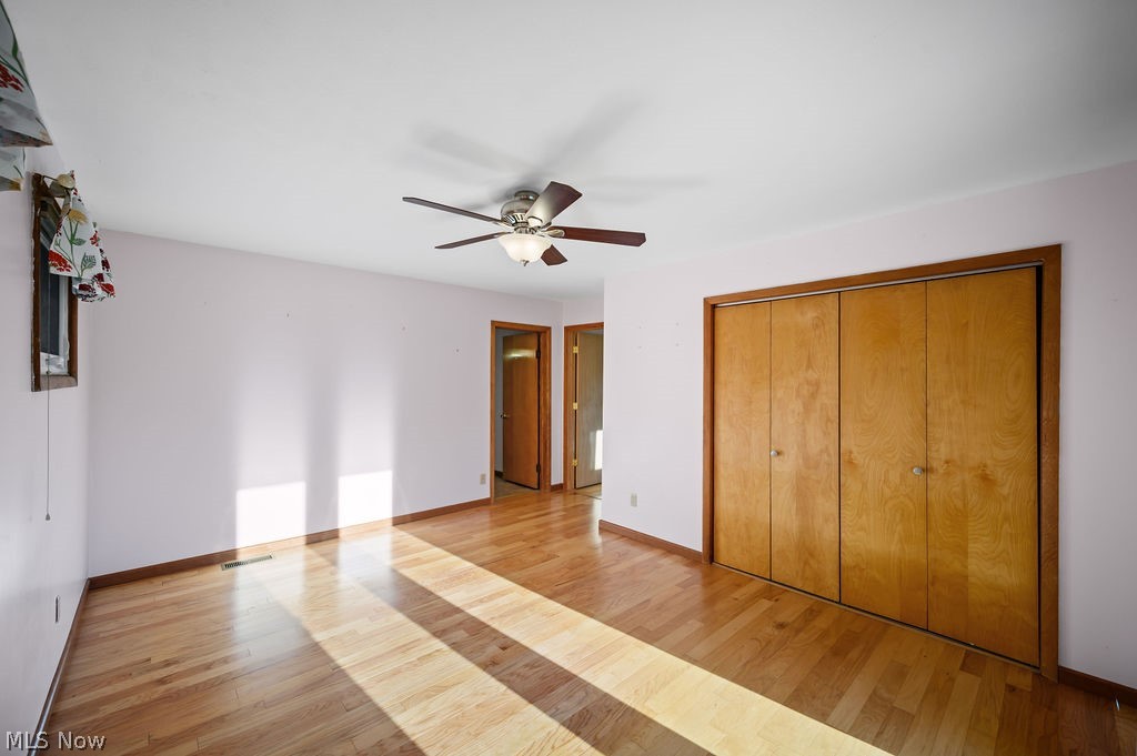11363 Dupont Road Washington, WV 26181 - Photo 14 of 42 Hardwood flooring throughout, ceiling fan