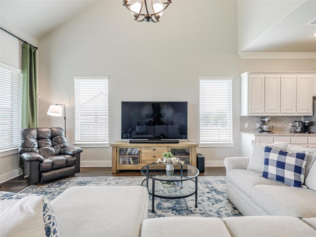 544 Majors Road Van Alstyne, TX 75495 - Photo 11 of 36 a living room with furniture and a flat screen tv