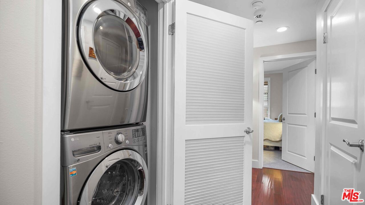 2240 South Beverly Glen Boulevard, Unit 103 Los Angeles, CA 90064 - Photo 15 of 27 a view of a hallway with washer and dryer
