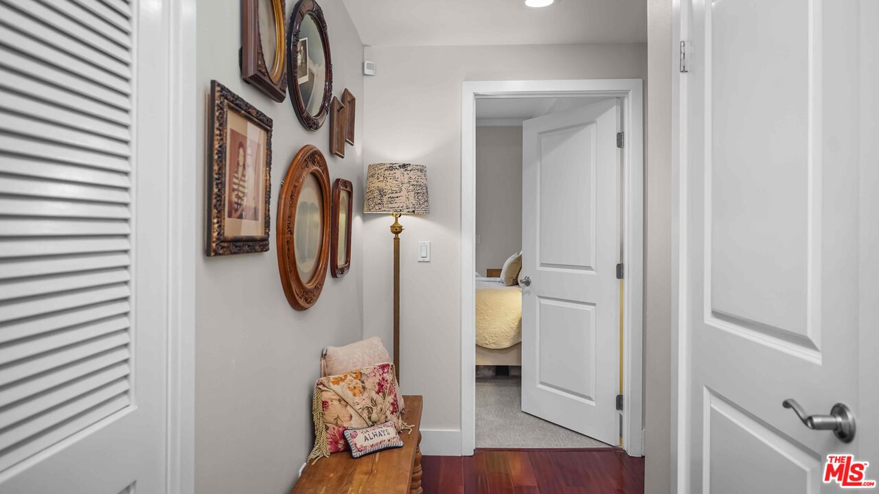 2240 South Beverly Glen Boulevard, Unit 103 Los Angeles, CA 90064 - Photo 16 of 27 a walk in closet with wooden floor