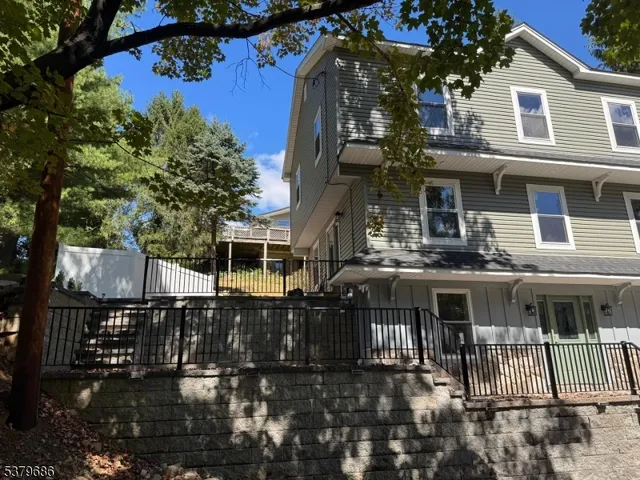a front view of a house with balcony