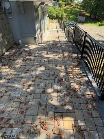 a view of a park with large trees