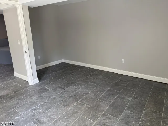 an empty room with a bathroom