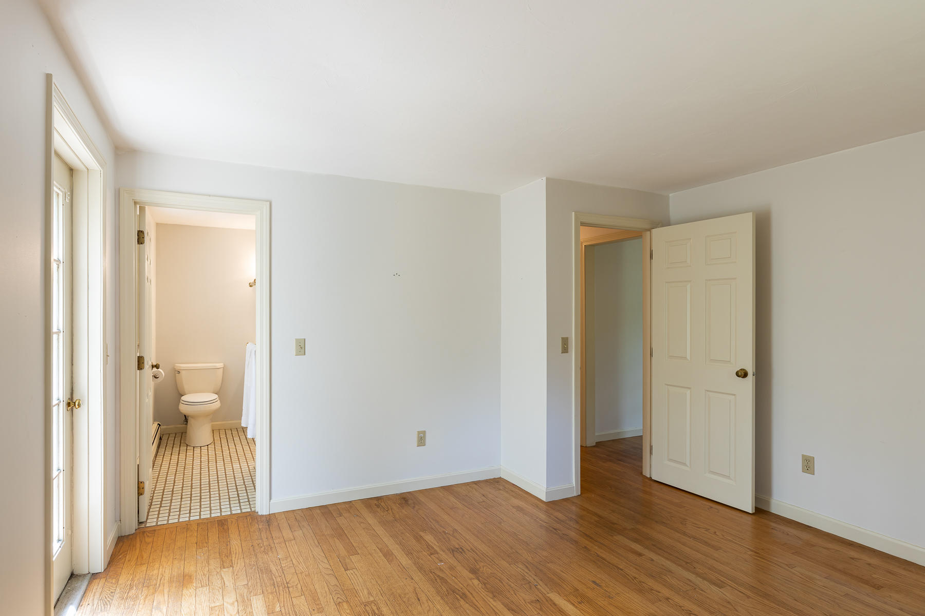 54 Crawford Road Cotuit, MA 02635 - Photo 19 of 46 a view of a room with wooden floor