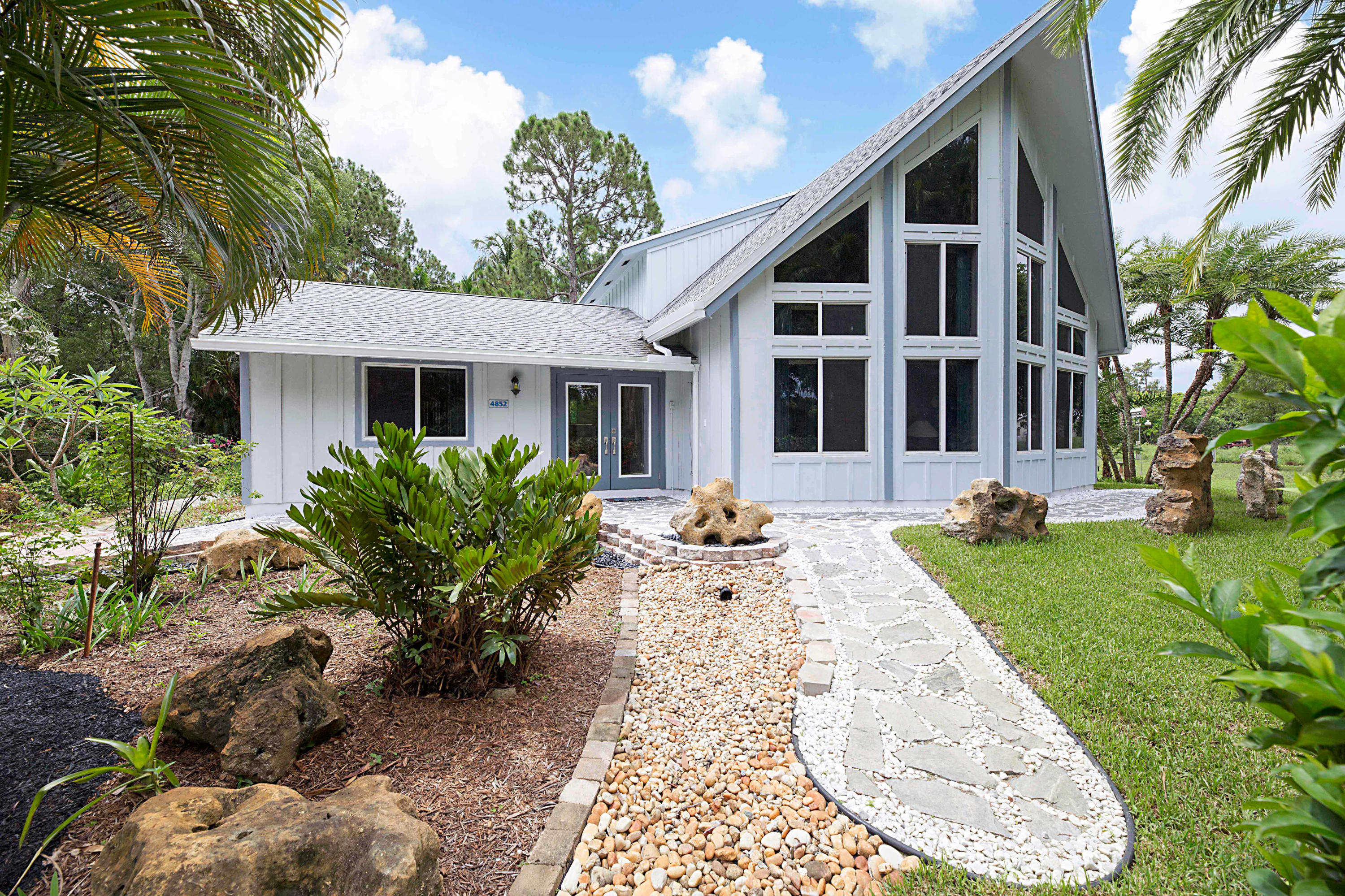 4852 Windmill Road Loxahatchee, FL 33470 - Photo 22 of 36 Beautiful Gardens