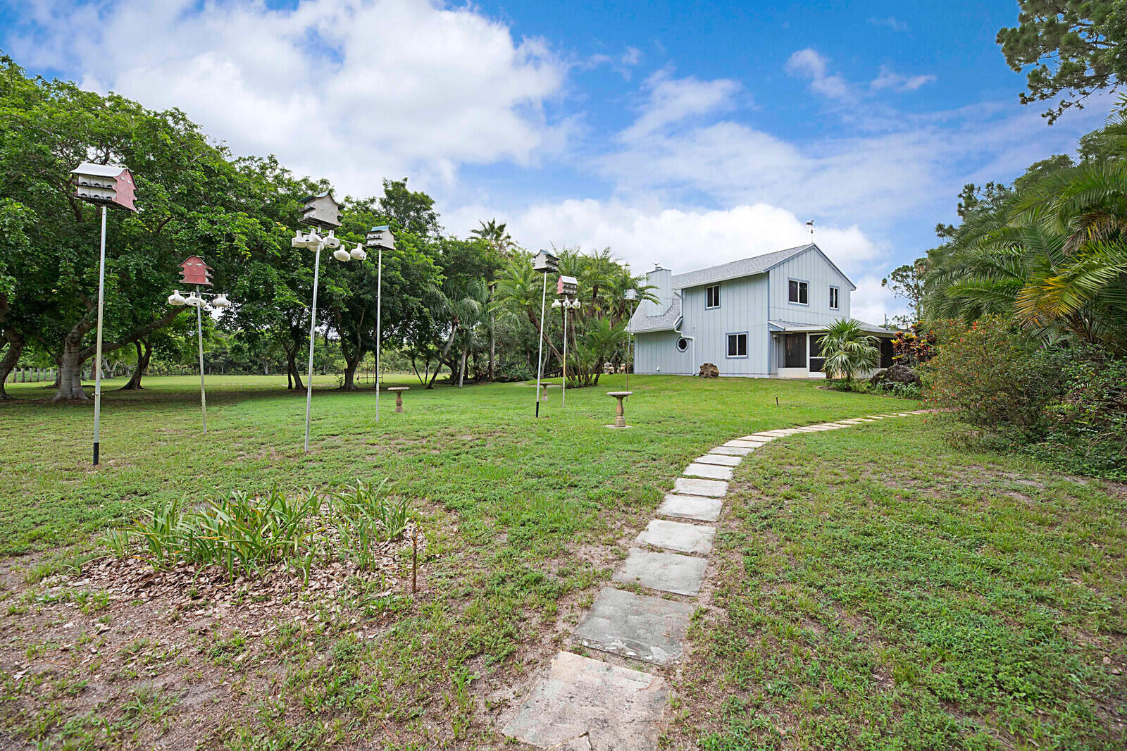 4852 Windmill Road Loxahatchee, FL 33470 - Photo 24 of 36 cleared and manicured gardens