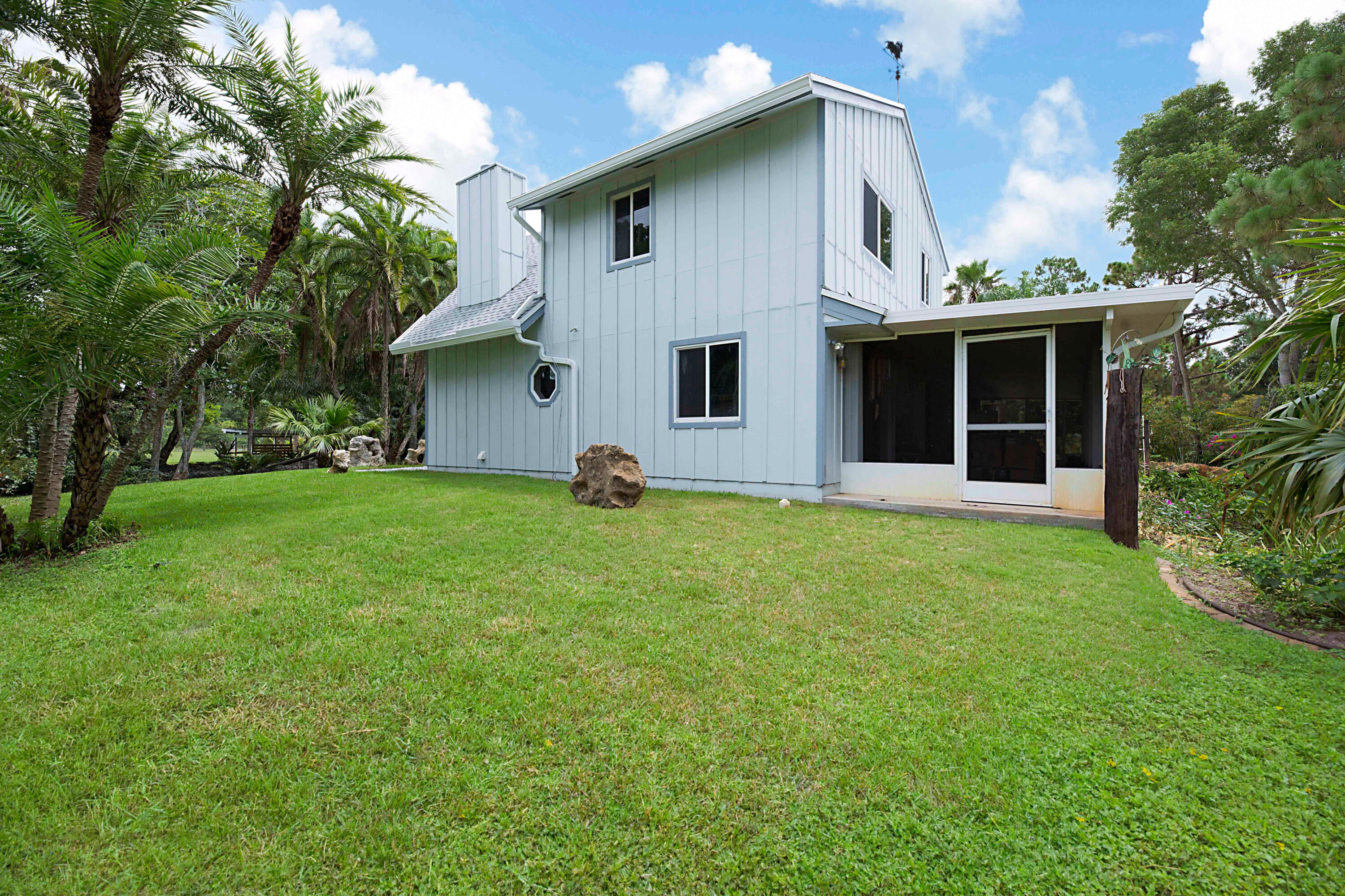 4852 Windmill Road Loxahatchee, FL 33470 - Photo 26 of 36 western view