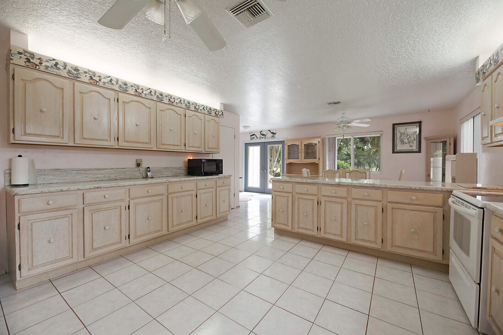 4852 Windmill Road Loxahatchee, FL 33470 - Photo 8 of 36 Lot's of counter and storage areas