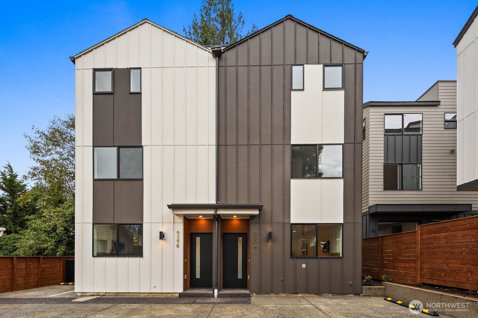 a front view of a house with garage