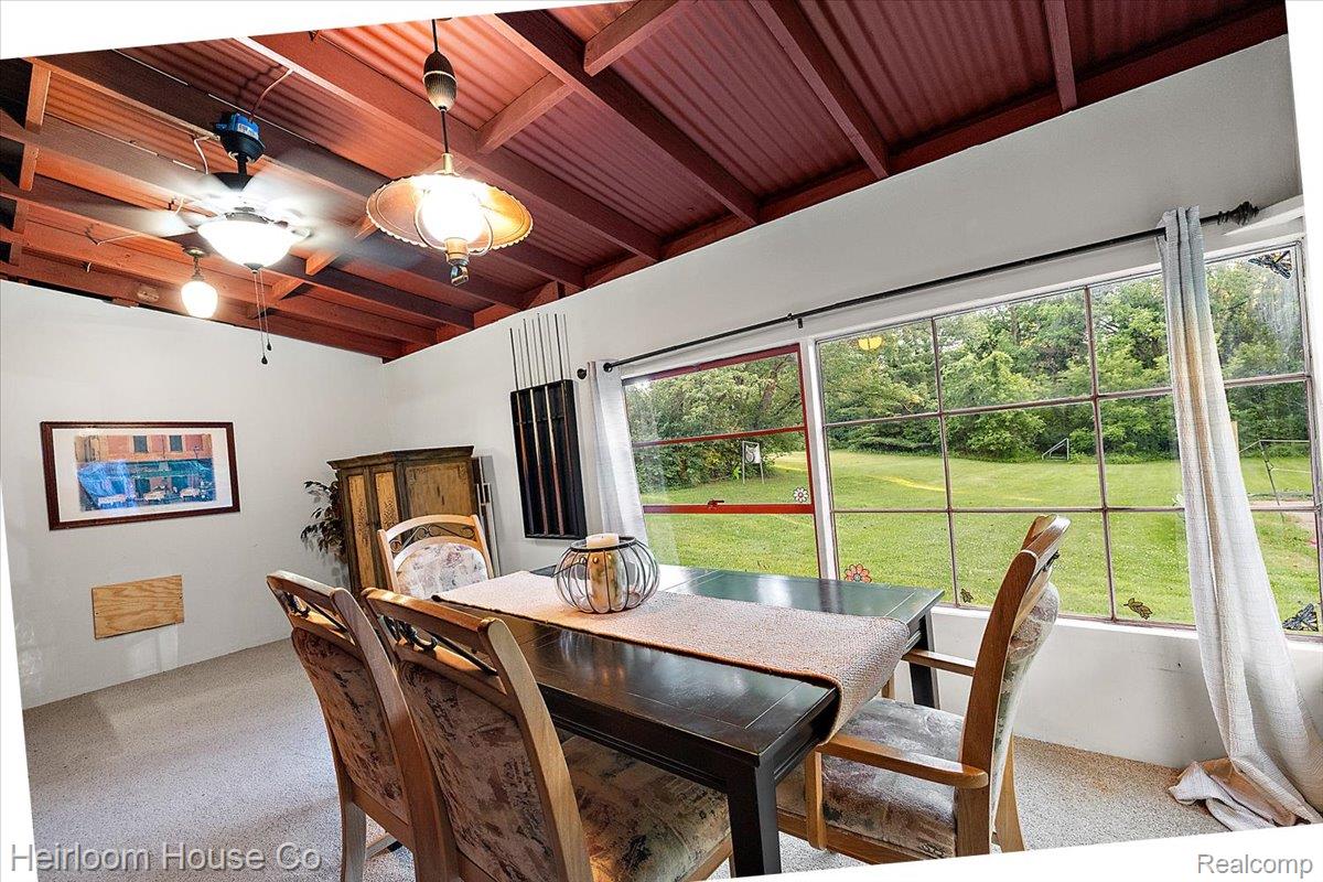 49001 Hanford Road Canton, MI 48187 - Photo 65 of 98 Dining area with an exposed beam ceiling featuring a red corrugated metal accent