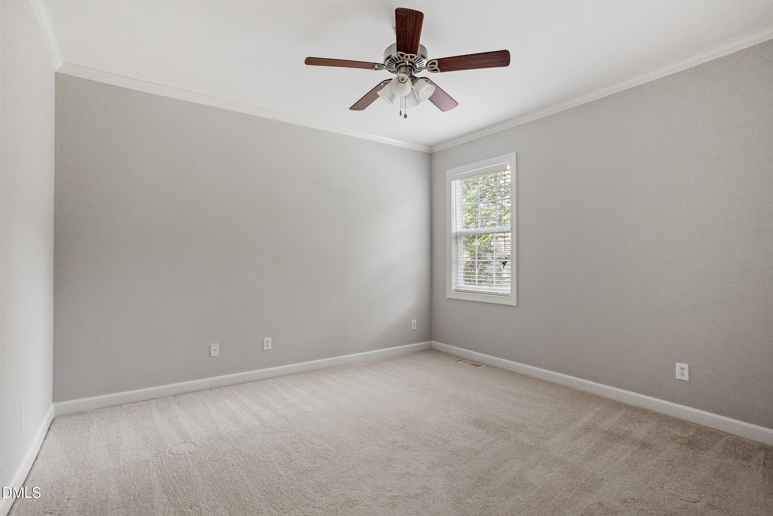 1019 Bianco Drive Raleigh, NC 27607 - Photo 14 of 29 a view of room with a ceiling fan and window