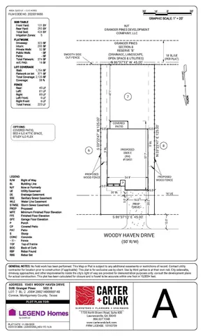 a kitchen with a refrigerator a stove a sink a center island and cabinets