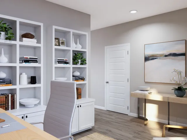 a bedroom with a bed and a flat screen television