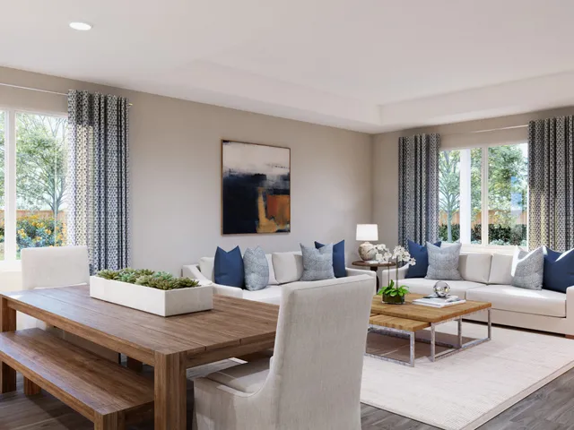 a view of a living room and entryway