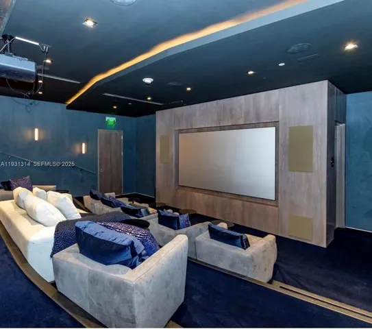 a large room with table and chairs