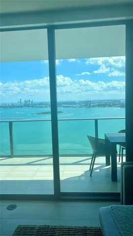 a bathroom with a double vanity sink toilet and shower