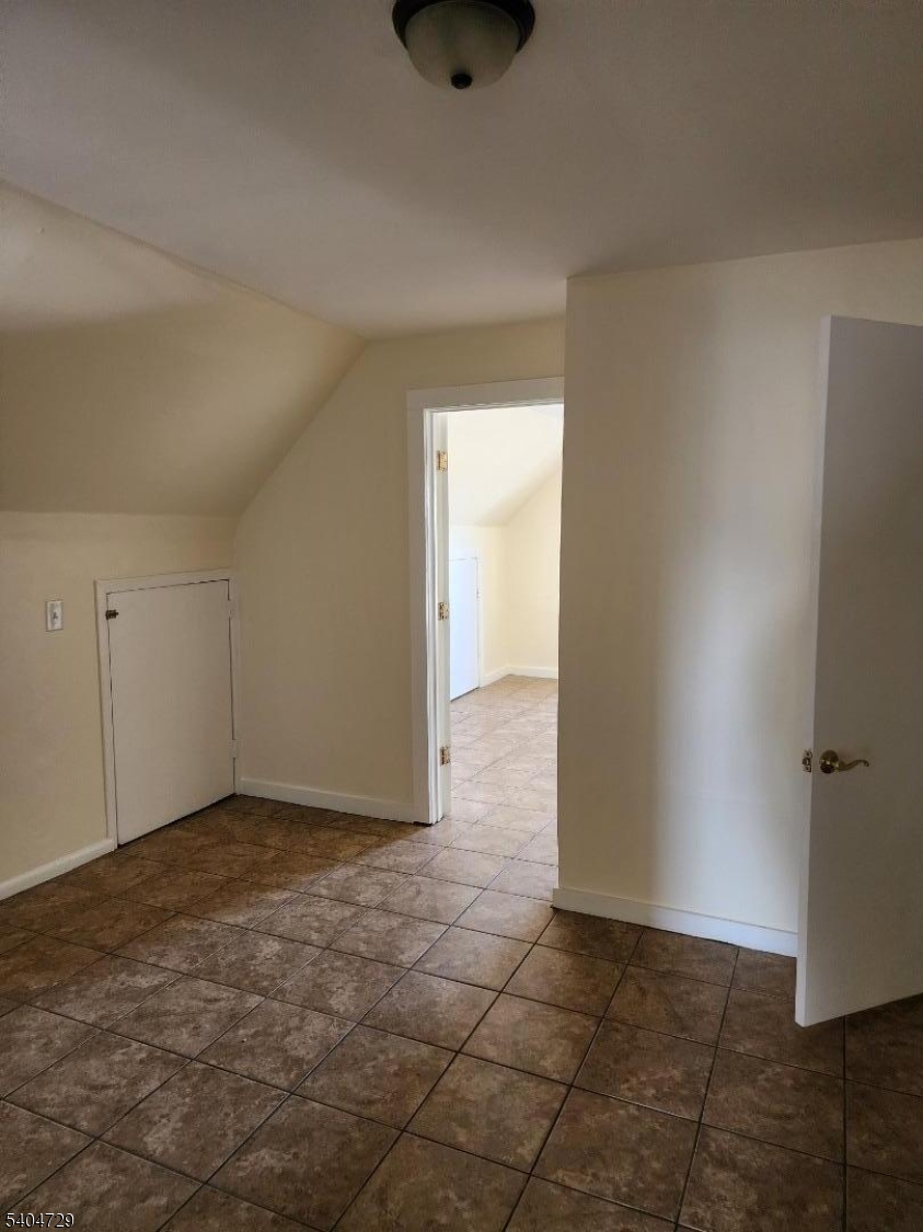 239 Magnolia Avenue Elizabeth Port, NJ 07206 - Photo 7 of 11 a view of an empty room