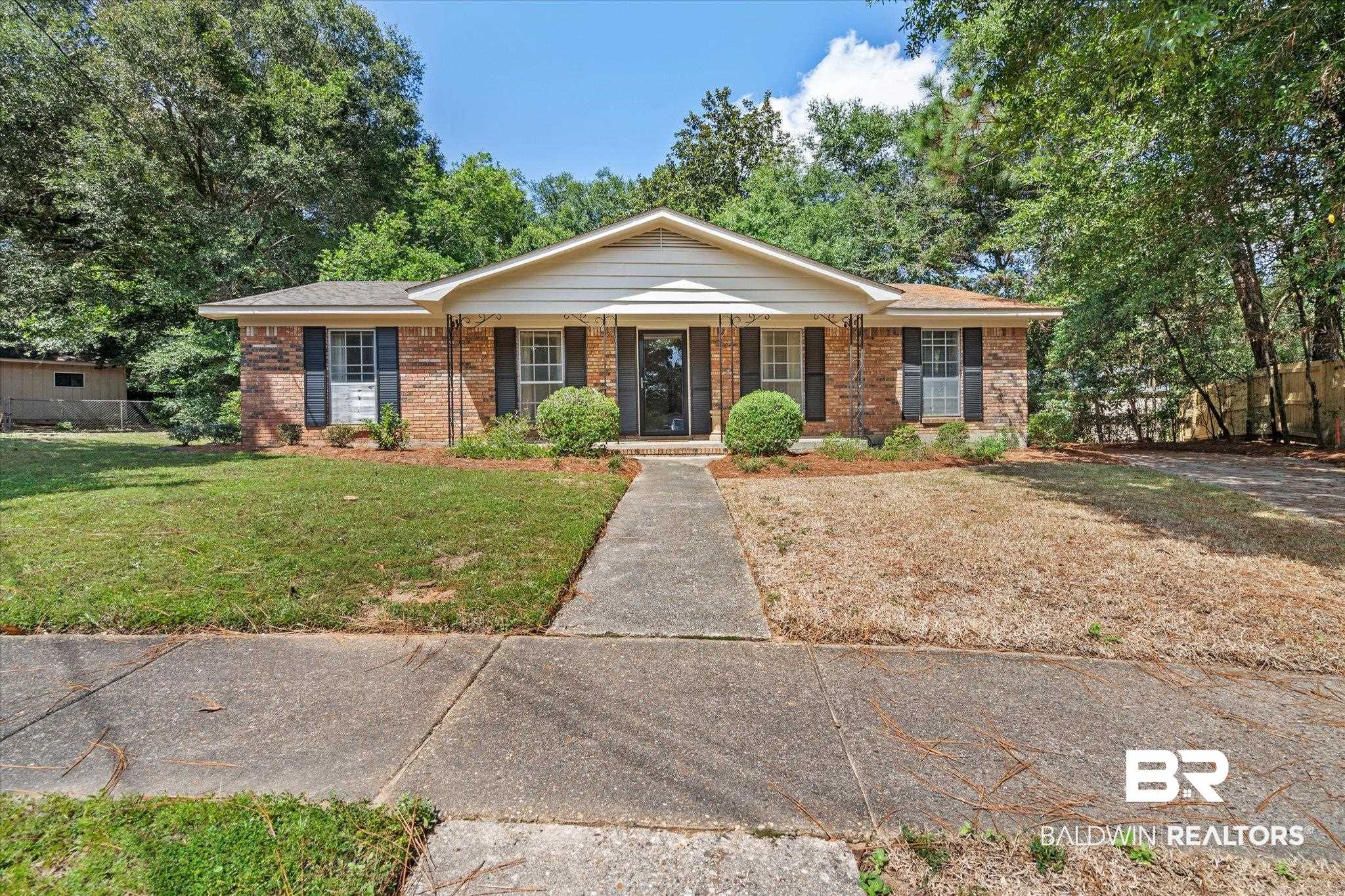 5608 Judson Circle Mobile, AL 36608 - Photo 1 of 20 Ranch-style home featuring a front lawn
