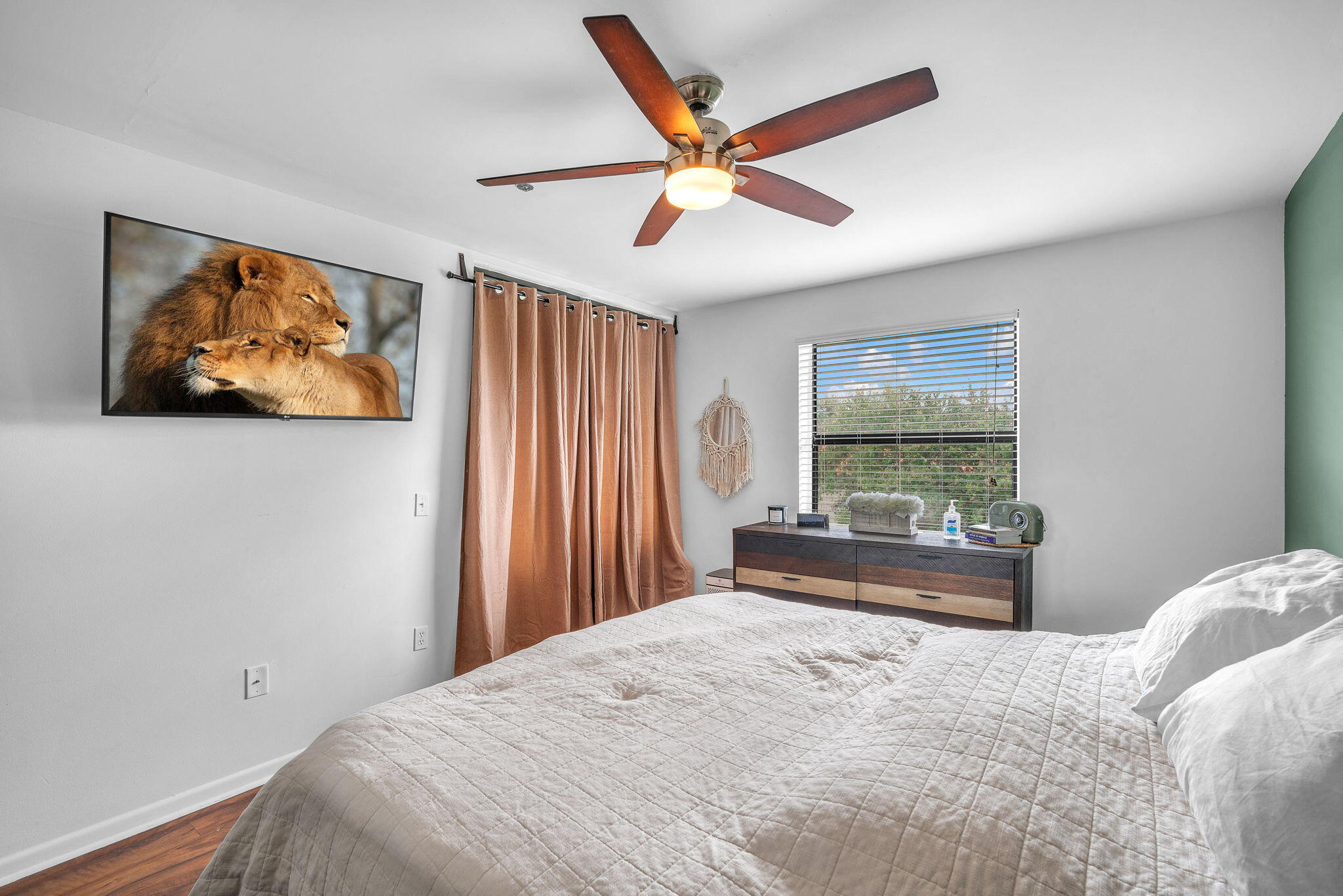 5157 Floria Way, Unit T Boynton Beach, FL 33437 - Photo 12 of 40 a bedroom with a bed and a large window