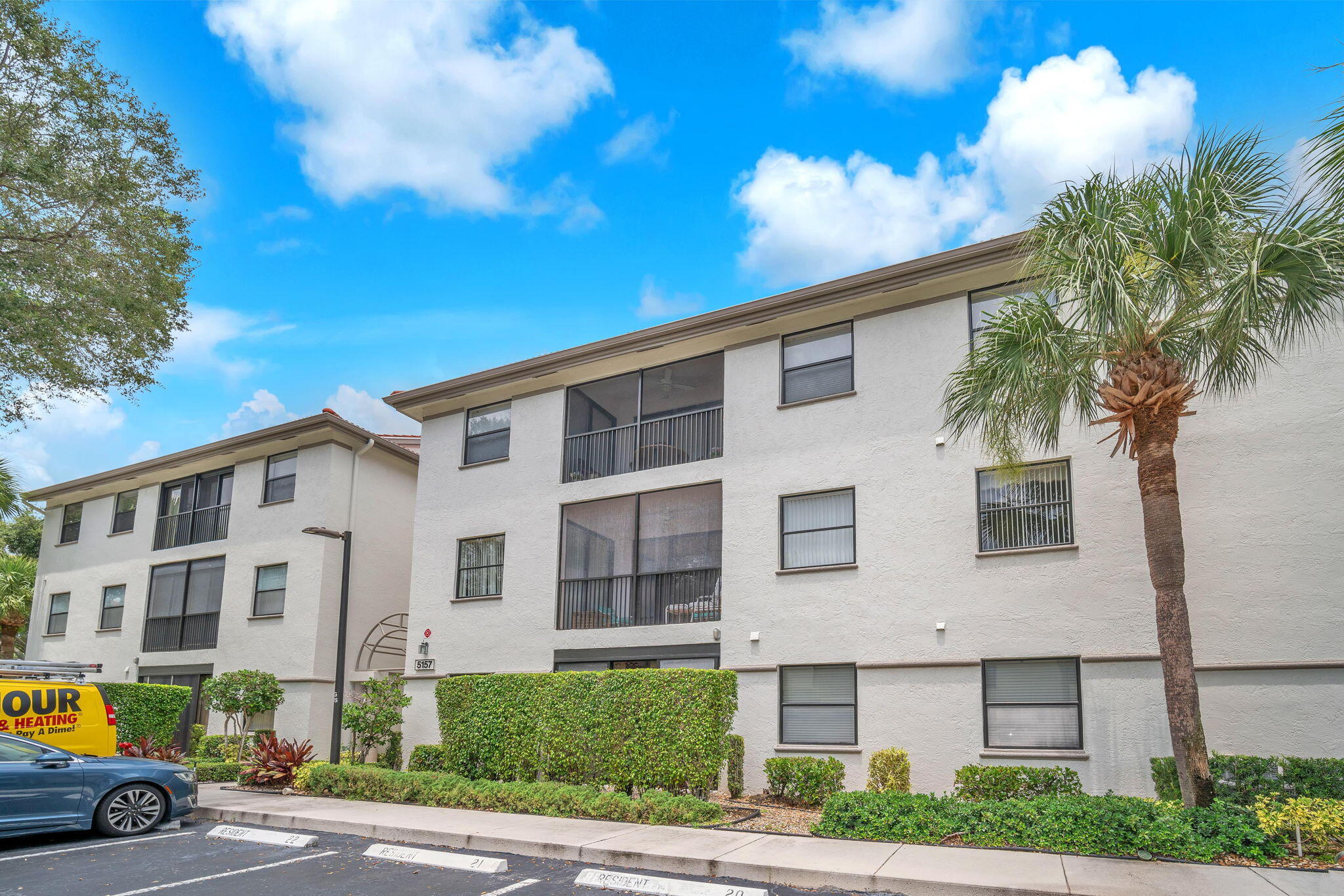 5157 Floria Way, Unit T Boynton Beach, FL 33437 - Photo 24 of 40 a front view of a building with street view