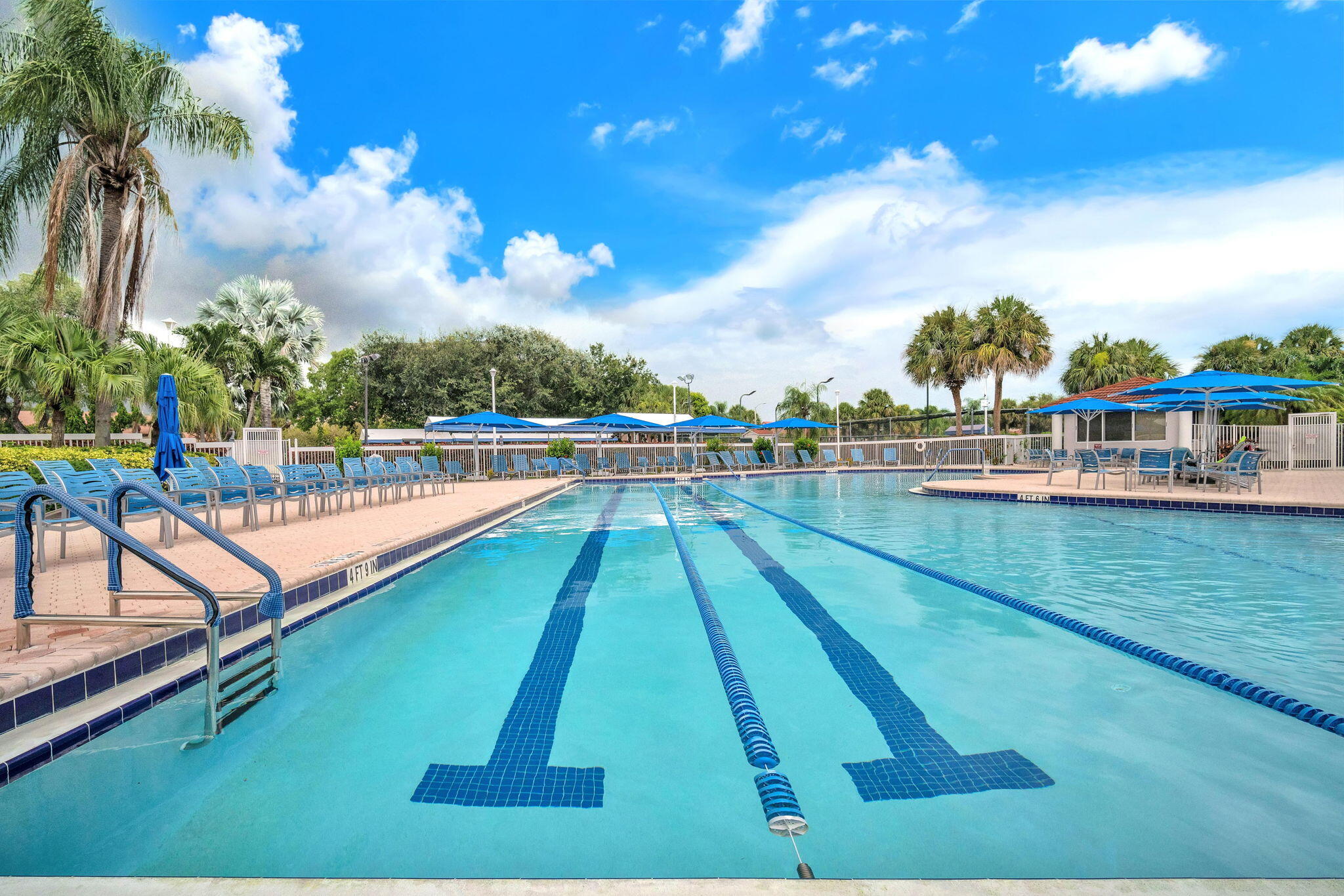 5157 Floria Way, Unit T Boynton Beach, FL 33437 - Photo 28 of 40 a view of swimming pool with outdoor seating