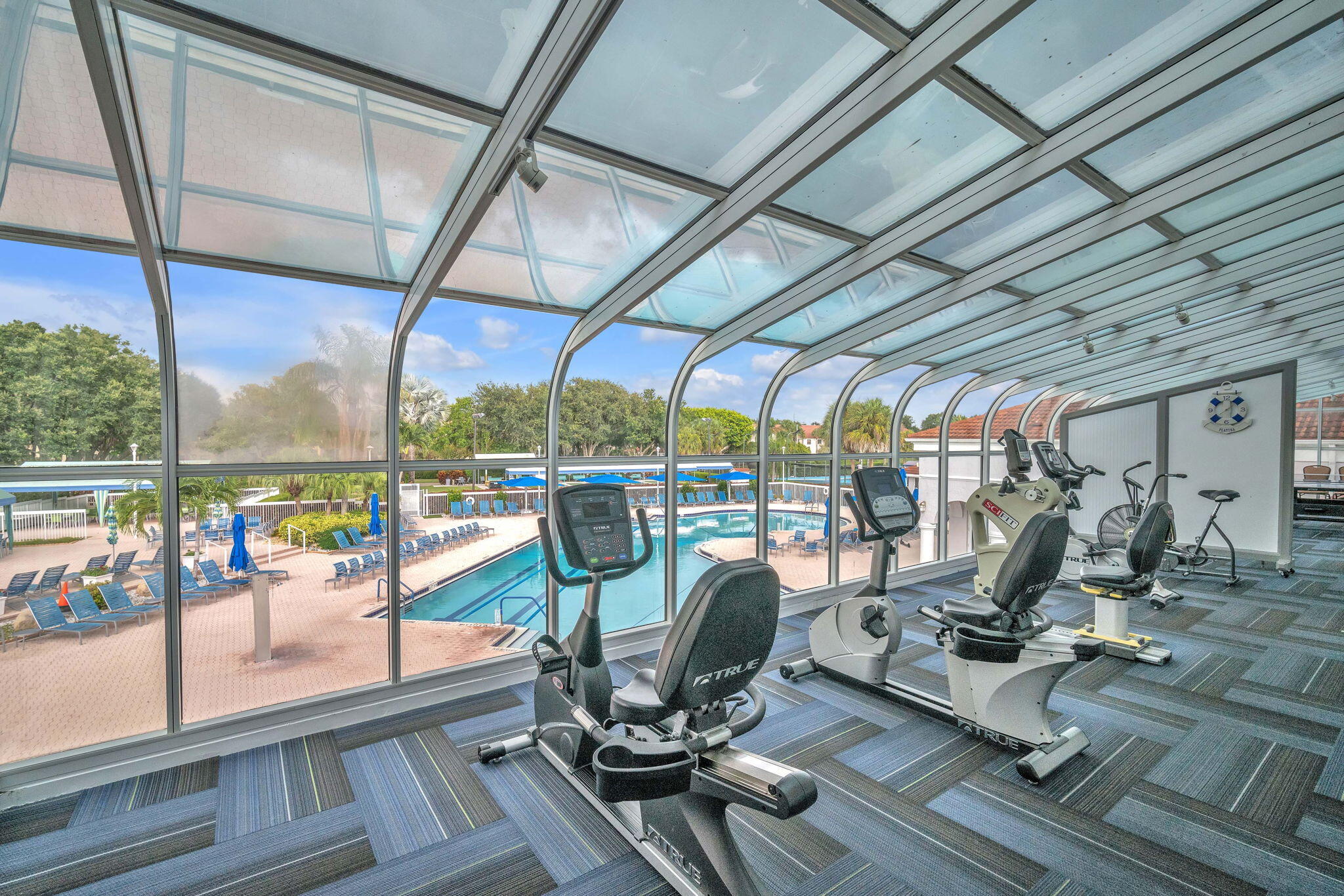 5157 Floria Way, Unit T Boynton Beach, FL 33437 - Photo 37 of 40 a view of a room with gym equipment