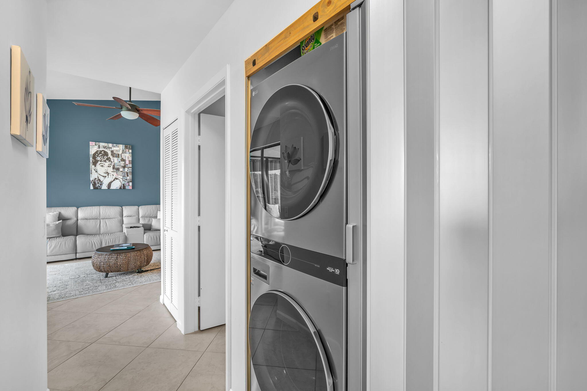 5157 Floria Way, Unit T Boynton Beach, FL 33437 - Photo 10 of 40 a view of a livingroom with washer and dryer