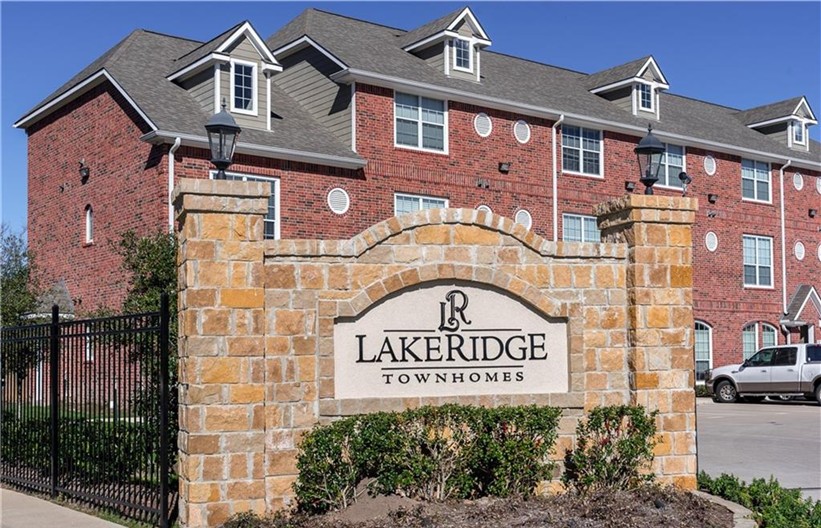 1198 Jones-Butler Road, Unit 2706 College Station, TX 77840 - Photo 1 of 17 a sign on the side of a building