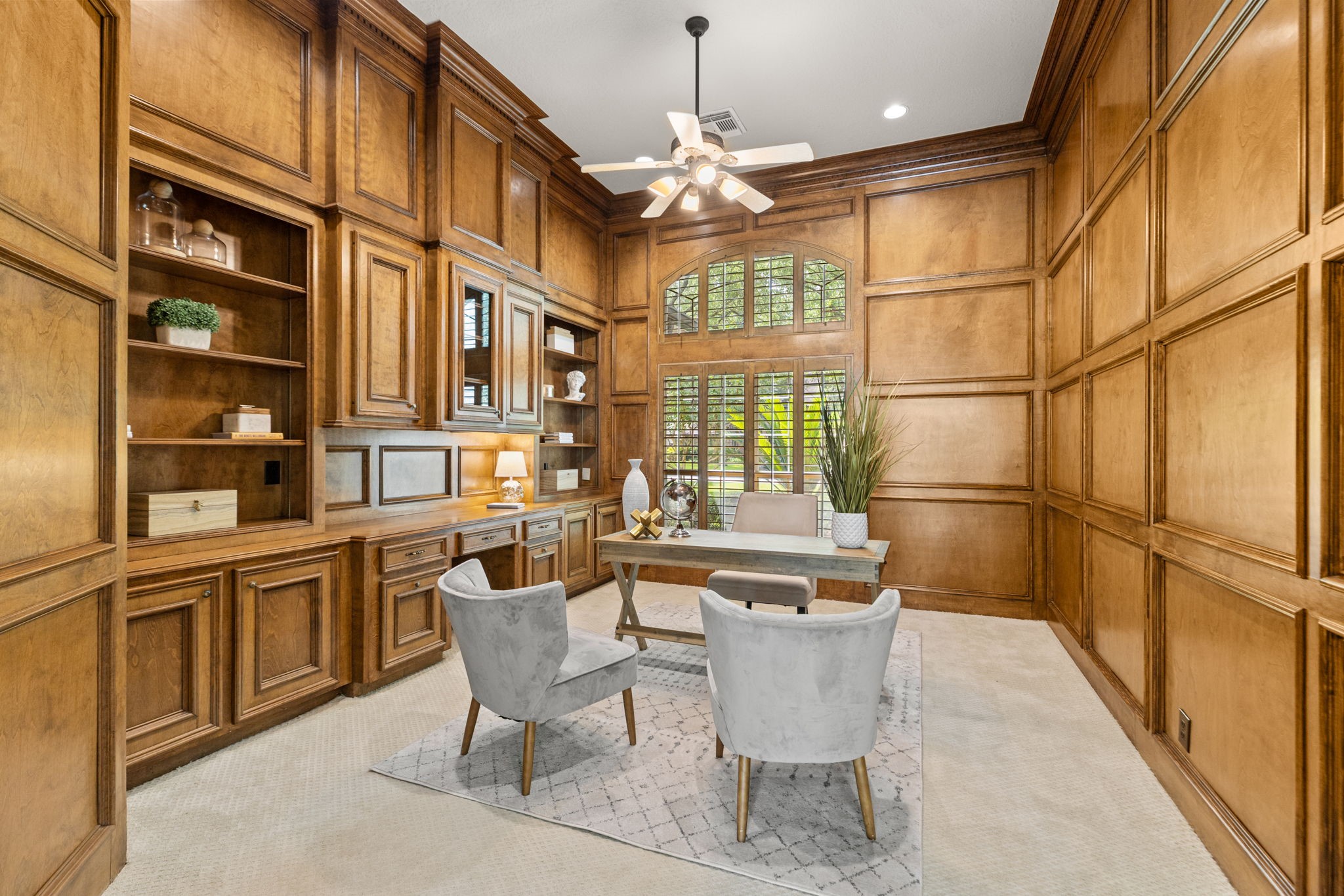 6610 Radley Drive Spring, TX 77379 - Photo 10 of 50 Solid wood floor-to-ceiling panels with built in desk and shelving to inspire successful mindsets. Entire room was wood polished prior to listing date.