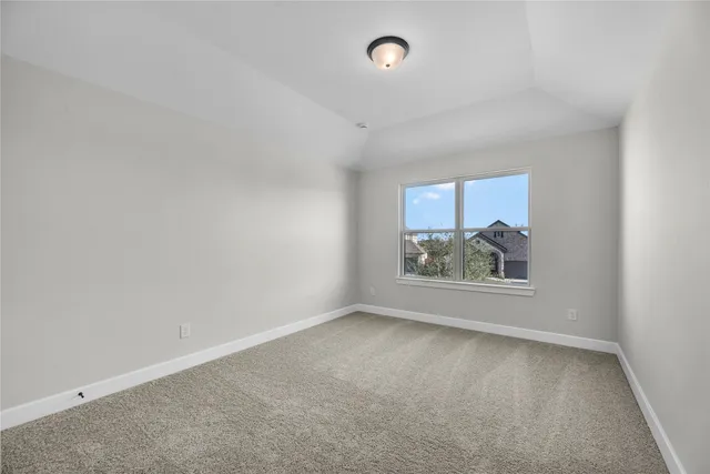 a view of a hallway with seating area