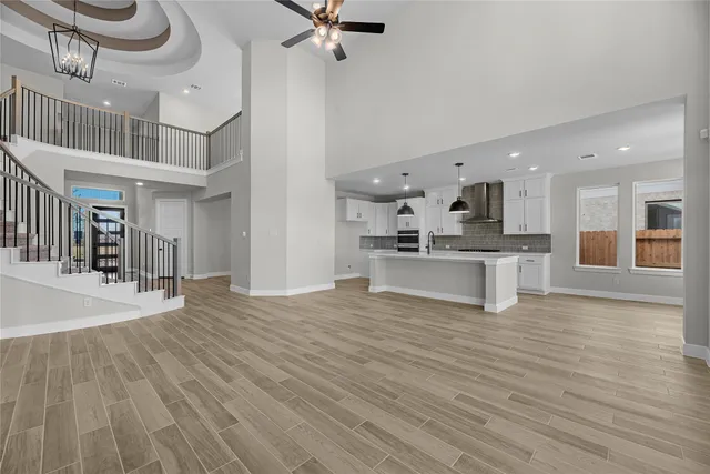 a view of kitchen with cabinets and wooden floor