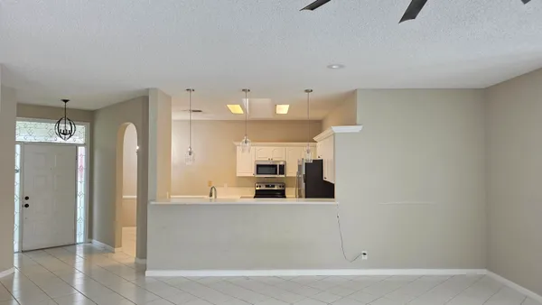 a view of a kitchen with a sink