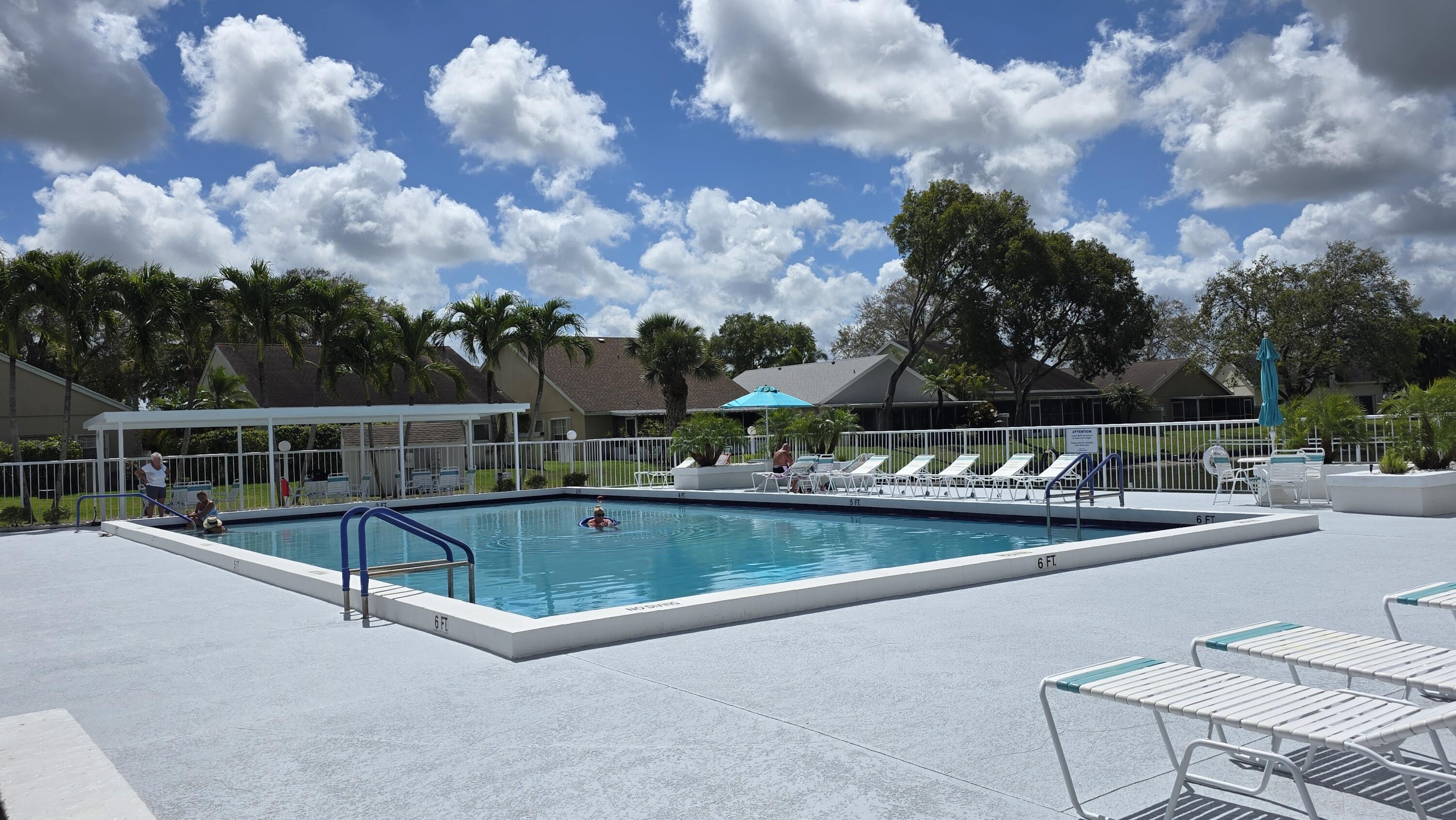 7769 Mansfield Hollow Road Delray Beach, FL 33446 - Photo 27 of 27 a view of swimming pool with seating