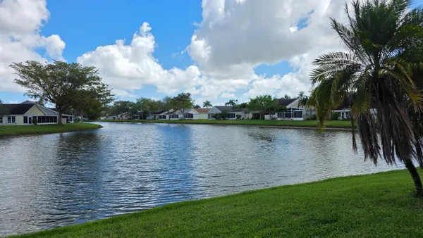 a view of a lake with a big yard