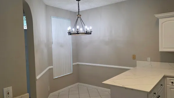 a view of a kitchen with a sink and dishwasher