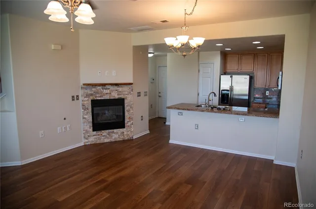 a spacious bathroom with a sink and a mirror