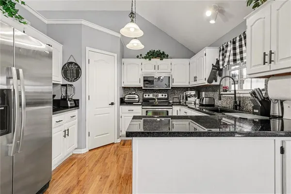 $350,000 | 709 Derby Street, Raymore, MO 64083