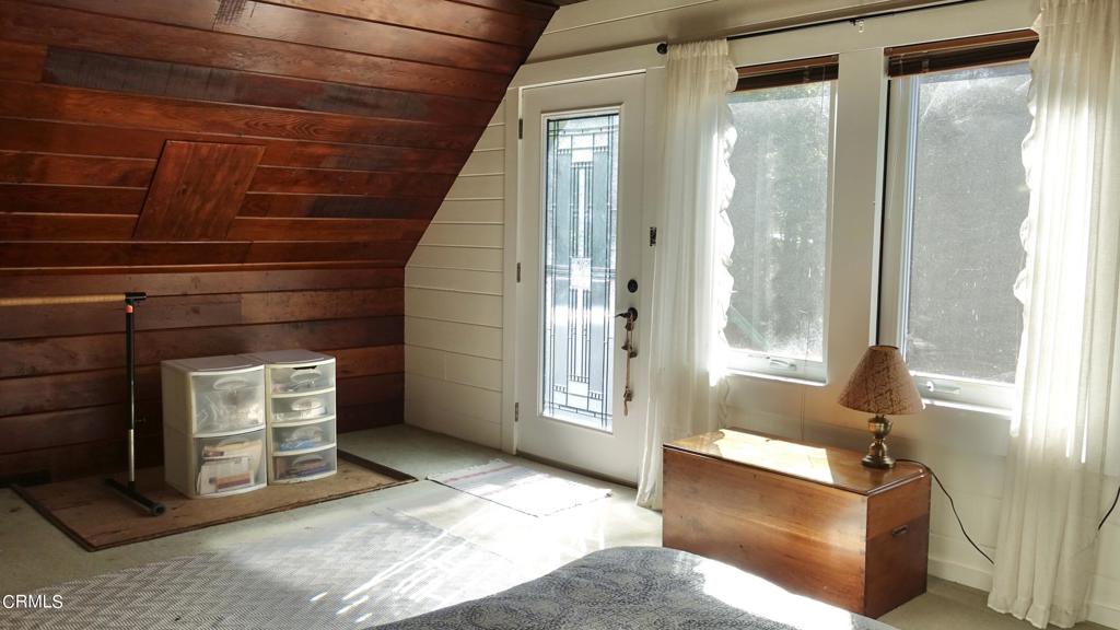 31421 State Highway 20 Fort Bragg, CA 95437 - Photo 12 of 28 a living room with furniture and a fireplace