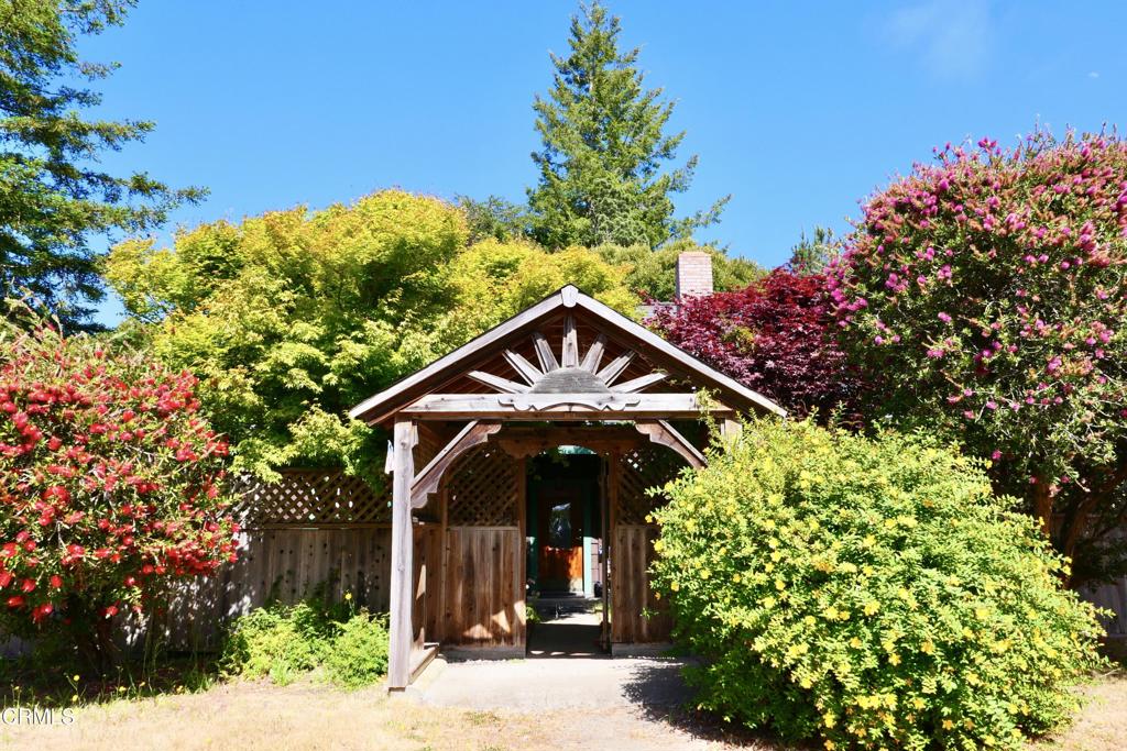 31421 State Highway 20 Fort Bragg, CA 95437 - Photo 2 of 28 a view of a house with a flower garden