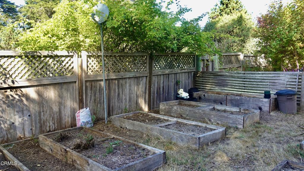 31421 State Highway 20 Fort Bragg, CA 95437 - Photo 25 of 28 a view of a backyard with a bench